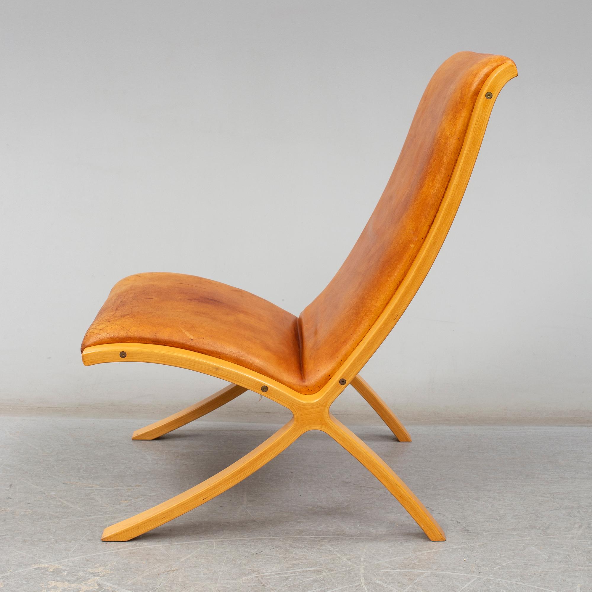PETER HVIDT & ORLA MØLGAARD NIELSEN, an 'X-stolen' easy chair from Fritz Hansen, Denmark.