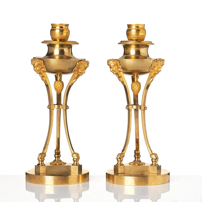 A pair of Empire tripod shaped casolettes.