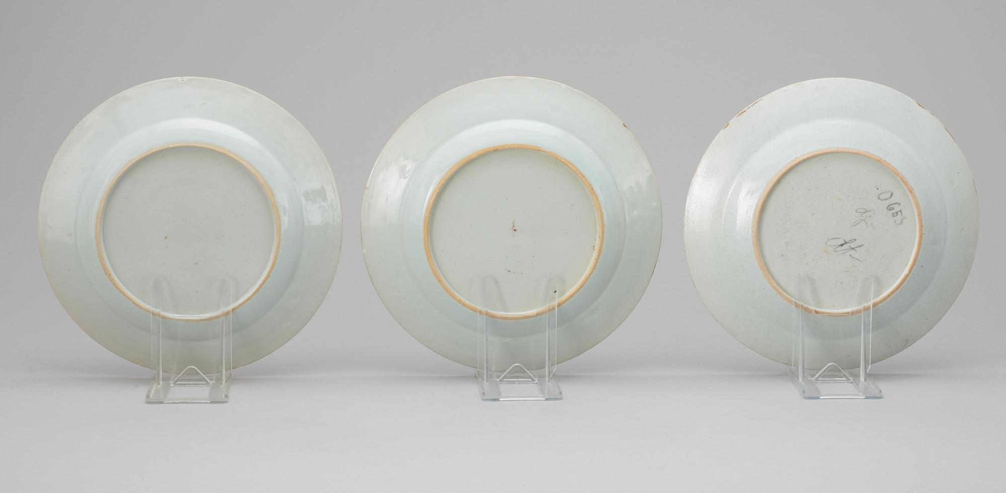 A set of three famille rose dinner plates, Qing dynasty, Qianlong (1736-95).