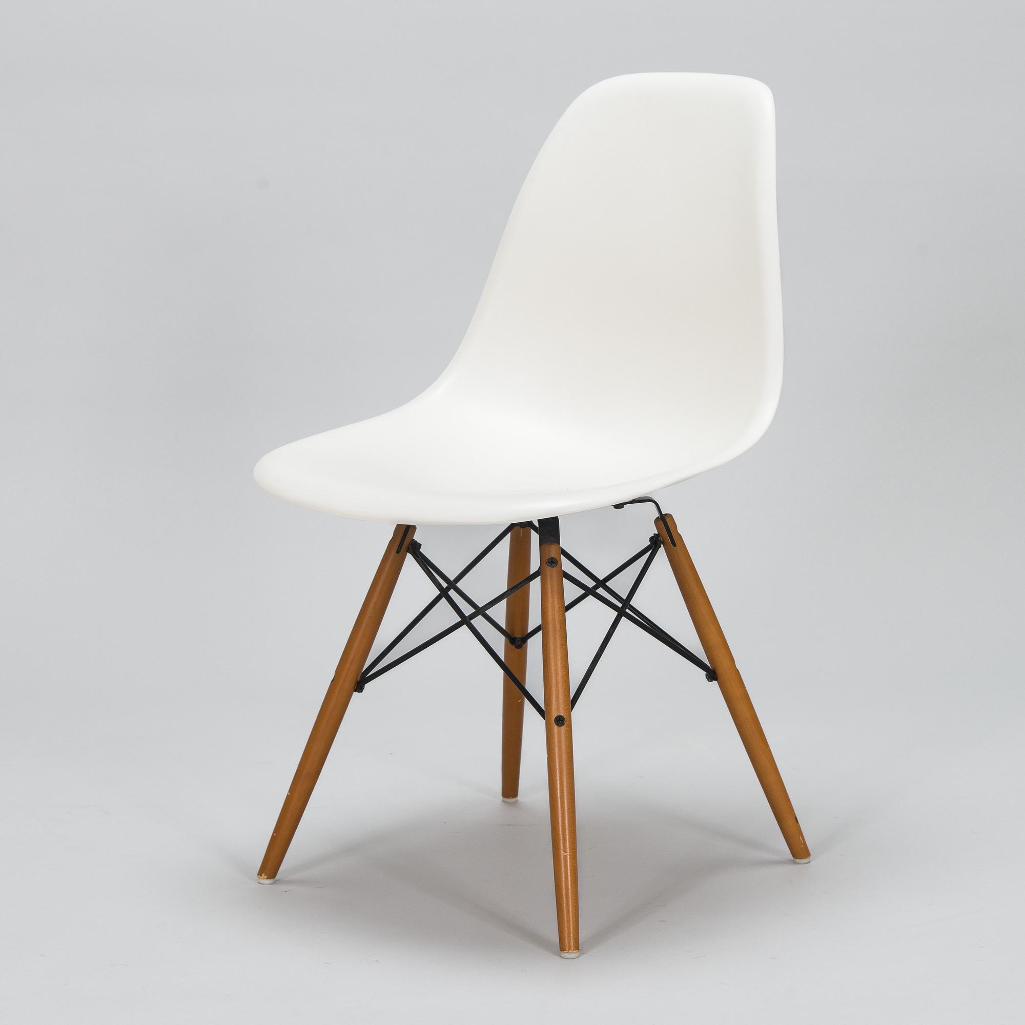 A 'Plastic chair DSW' by Charles and Ray Eames for Vitra.