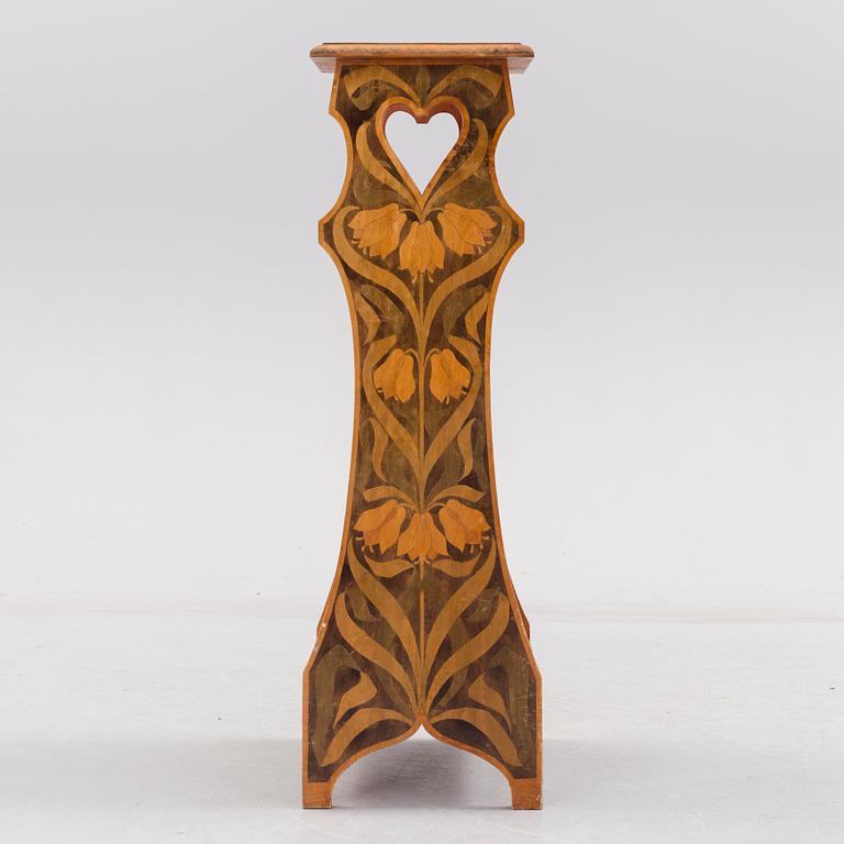 An early 20th century art nouveau shelf.