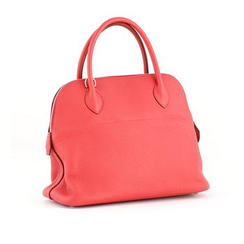 HERMÈS, a pink coral leather bag.