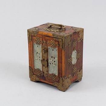 A Chinese stone and wooden cabinet, 20th century.