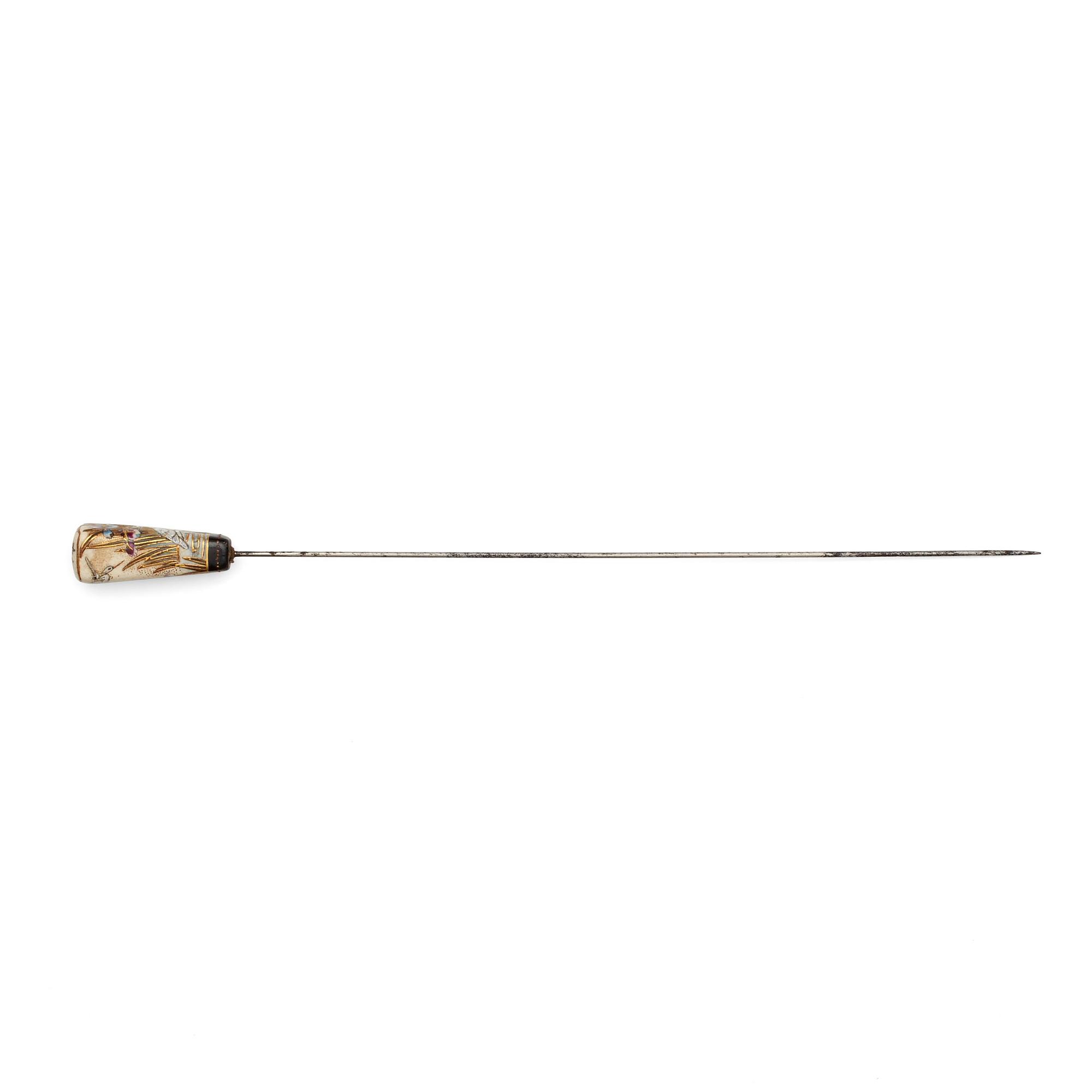 A Japanese painted hat pin, Meiji (1868-1912).
