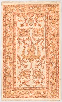 A oriental carpet. Circa 124x76 cm.