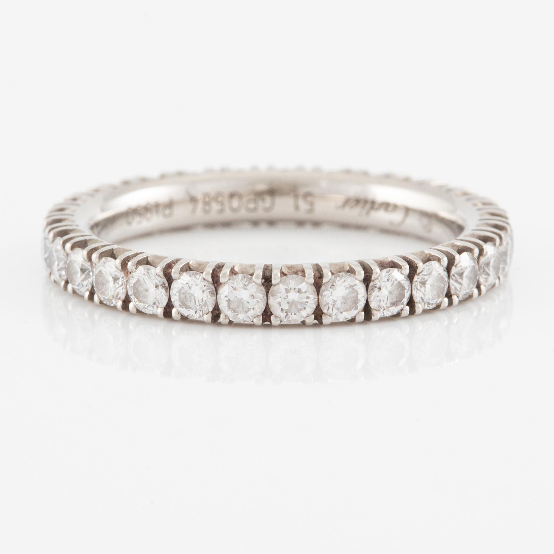 Cartier eternity ring in platinum with round brilliant-cut diamonds.