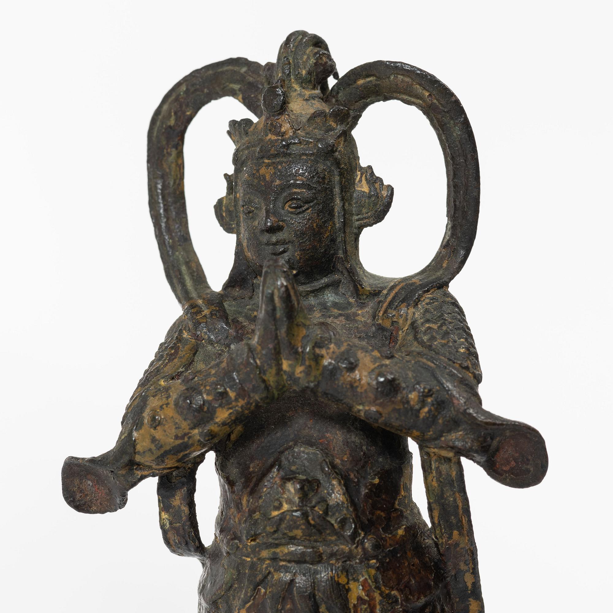A Chinese bronze figure of a guardsman, Ming dynasty (1368-1644).