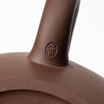 A group of three Chinese yixing teapots, 1960-80s.