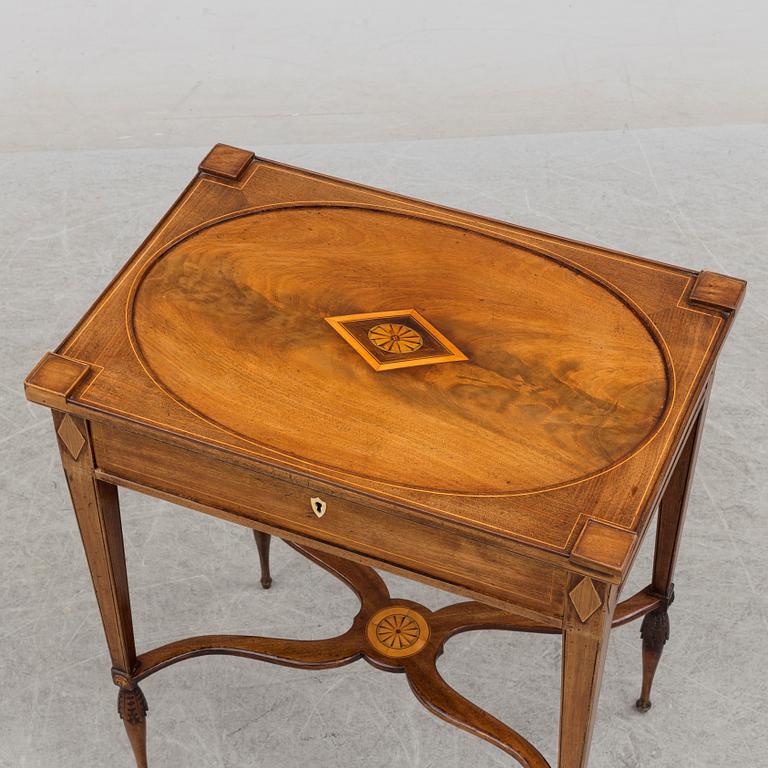 A circa 1800 table in the style of Lars Qvarnberg.