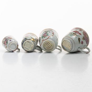 A group of 12 famille rose cups, Qing dynasty, Qianlong (1736-95).
