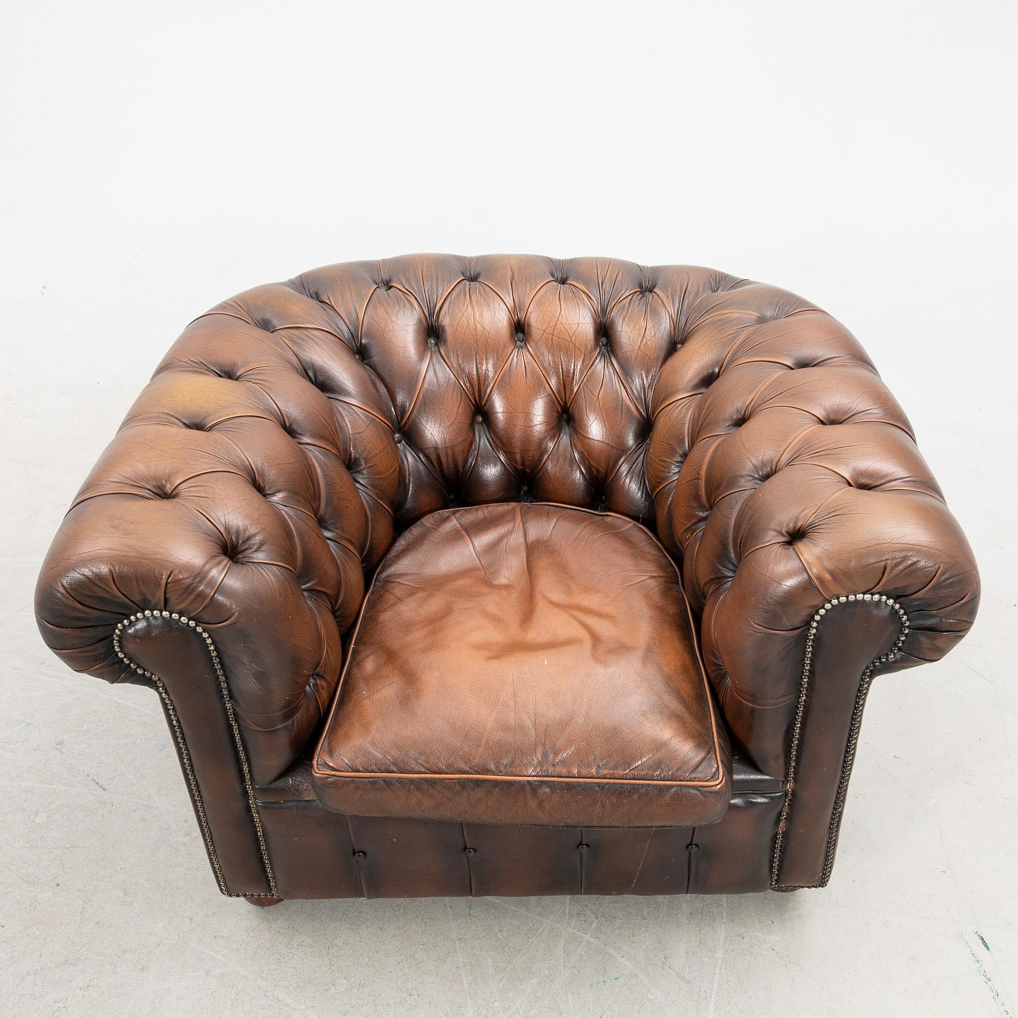 Sofa and armchair, Chesterfield, 20th century.