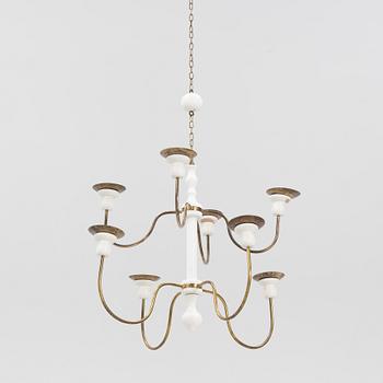 Josef Frank, a model '2586' wodden and brass chandelier, Firma Svenskt Tenn.