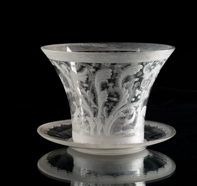 A Simon Gate 'Swedish Grace' engraved glass bowl with stand, Orrefors 1928, model nr 128.