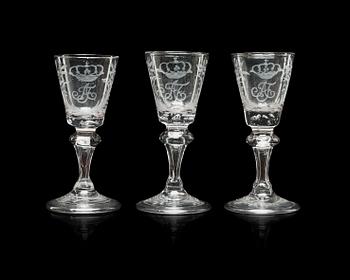 703. Three engraved glasses, 18th Century.