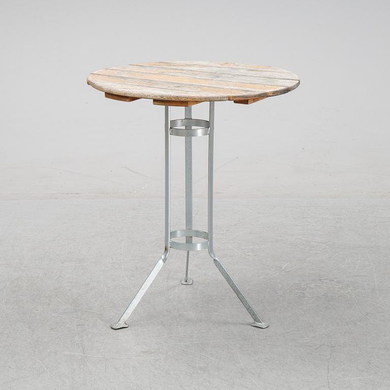 A set of four chairs and one table, Grythyttan, late 20th century.