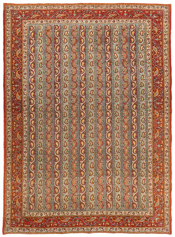 A carpet, semi-antique, Qum, ca 318 x 233 cm.