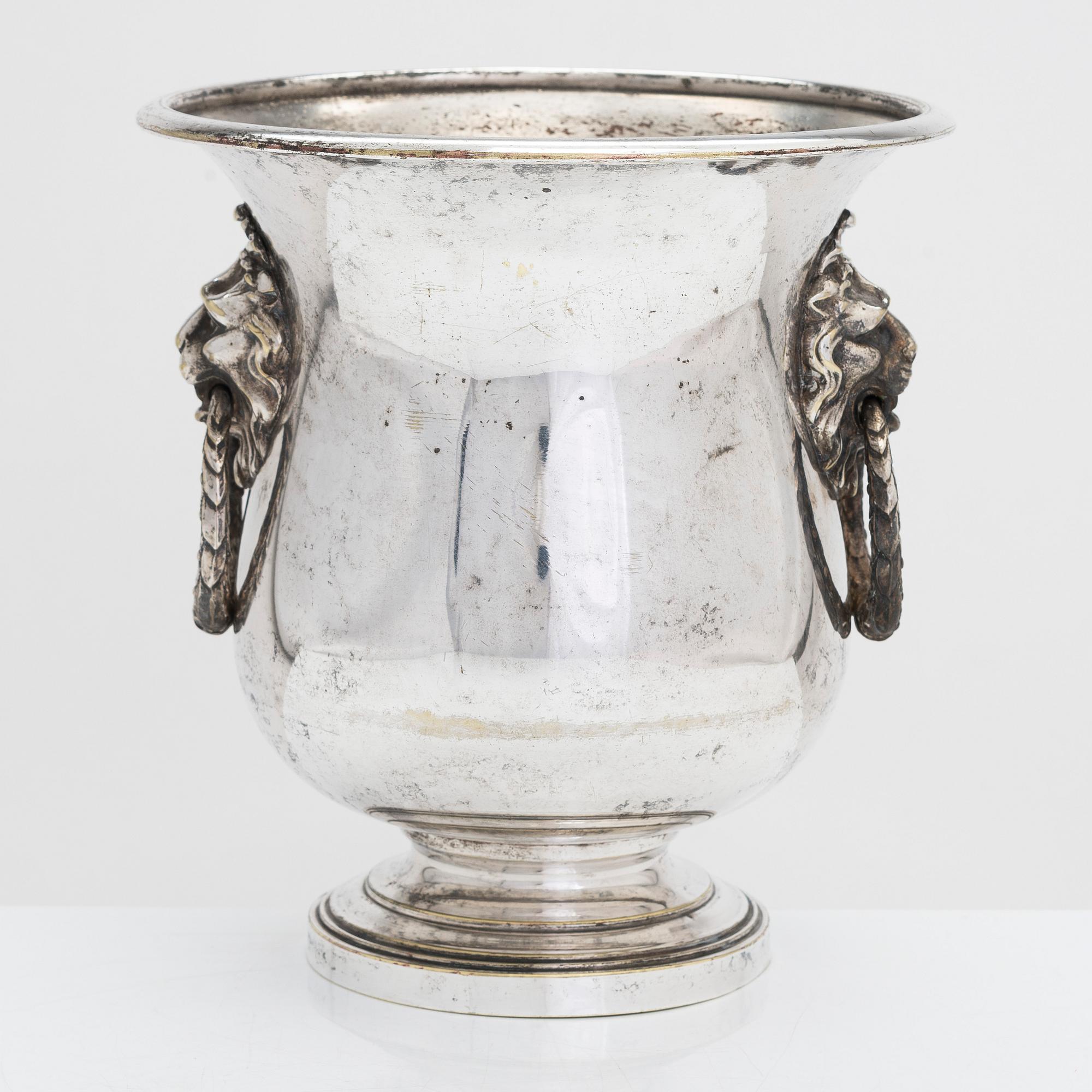 An early 19th century champagne cooler bucket.
