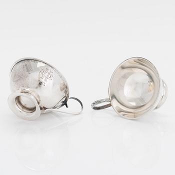 Two sterling silver bowls, Gustav Jansson 1955, 1960, and eight similar silver punsch cups, GAB and CGH 1933-41. Sweden.