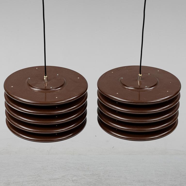 A par of 1970's ceiling lights.