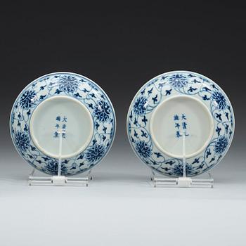 A pair of blue and white lotus dishes, Qing dynasty, Guangxu mark and period (1874-1908).