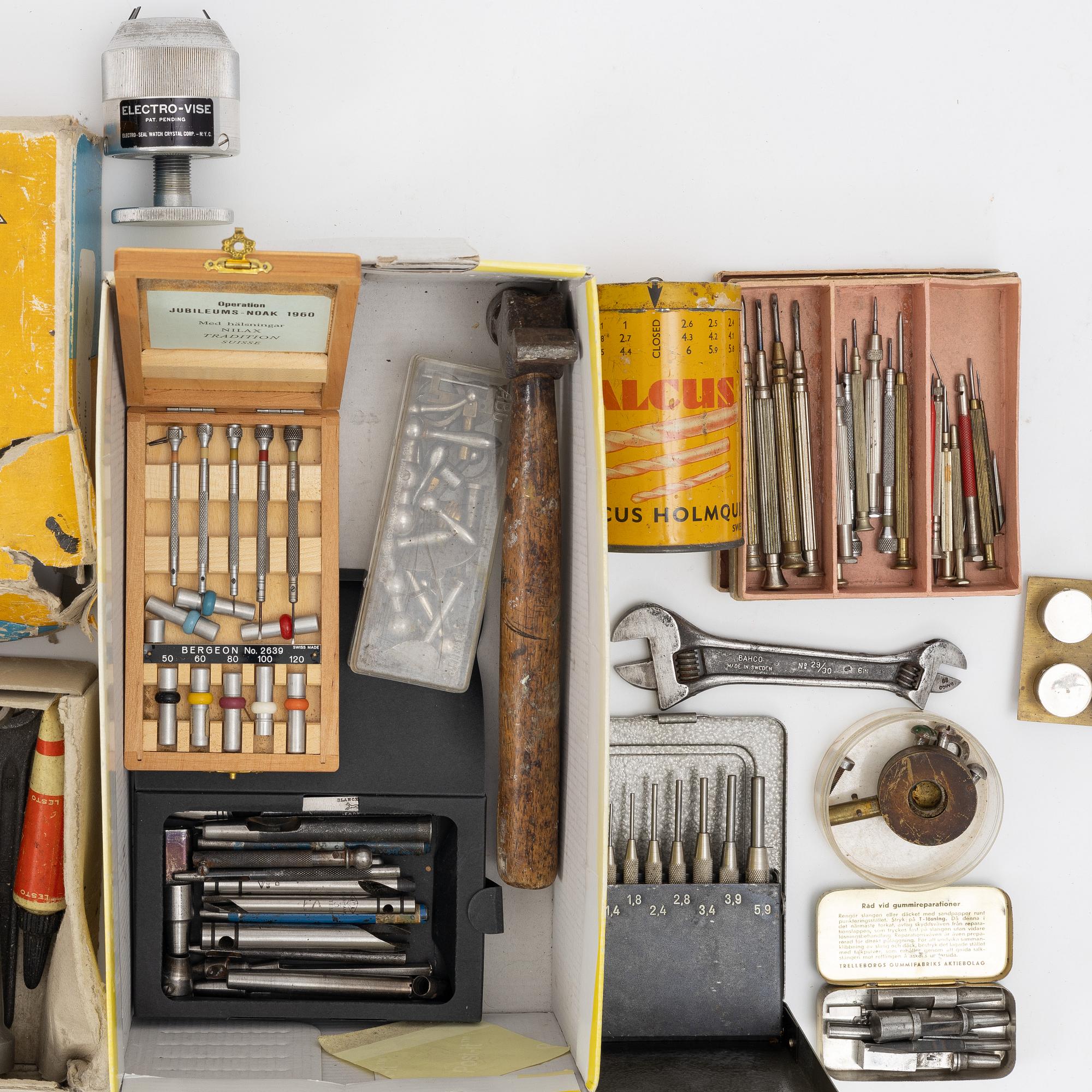 Watchmaking tools and spare parts, including a lathe by Lorch.