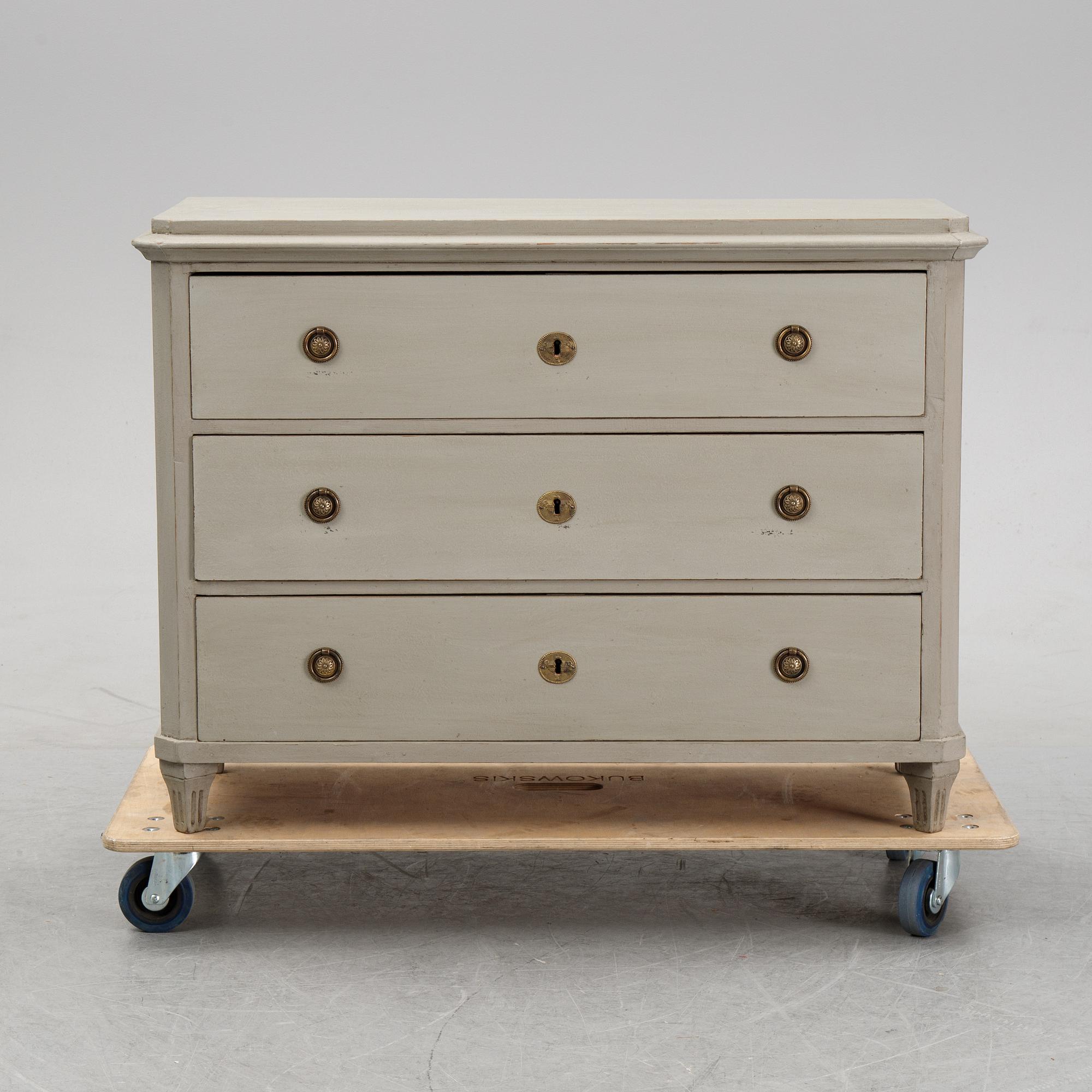 A painted 19th Century chest of drawers.