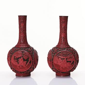 A pair of red lacquer vases, Qing dynasty (1644-1912).