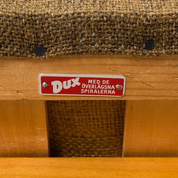 A 1940s  Dux sofa.