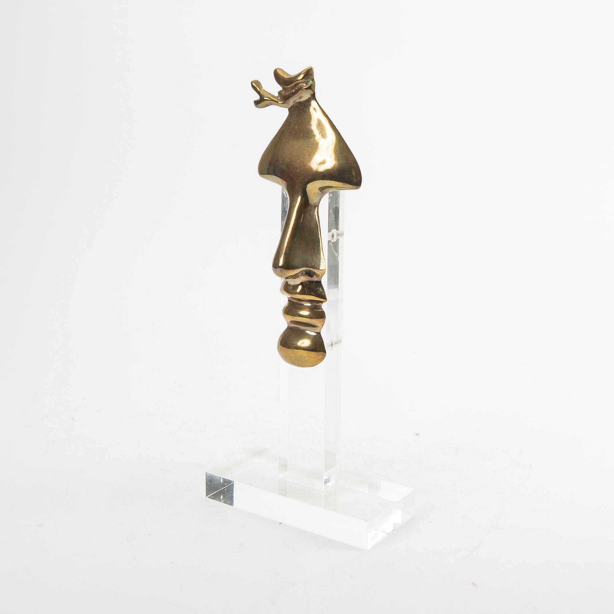 Arman,  skulptur signerad och numrerad 37/200. Utförd 1986.