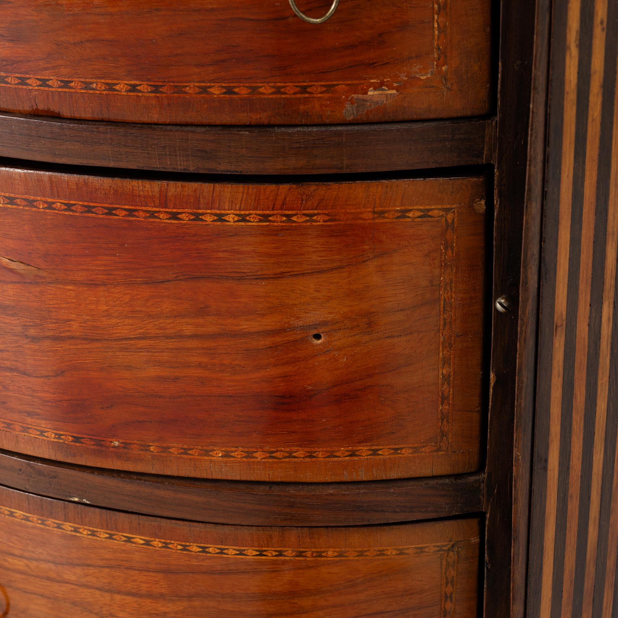 A small cabinet with drawers from around the year 1900.