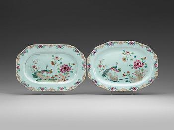 Two famille rose 'double peacock' chargers, Qing dynasty, Qianlong (1736-1795).