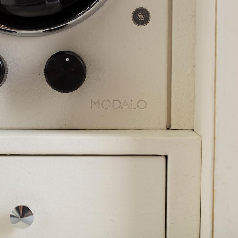 MODALO, winder, ca 18 x 18 x 22 cm.