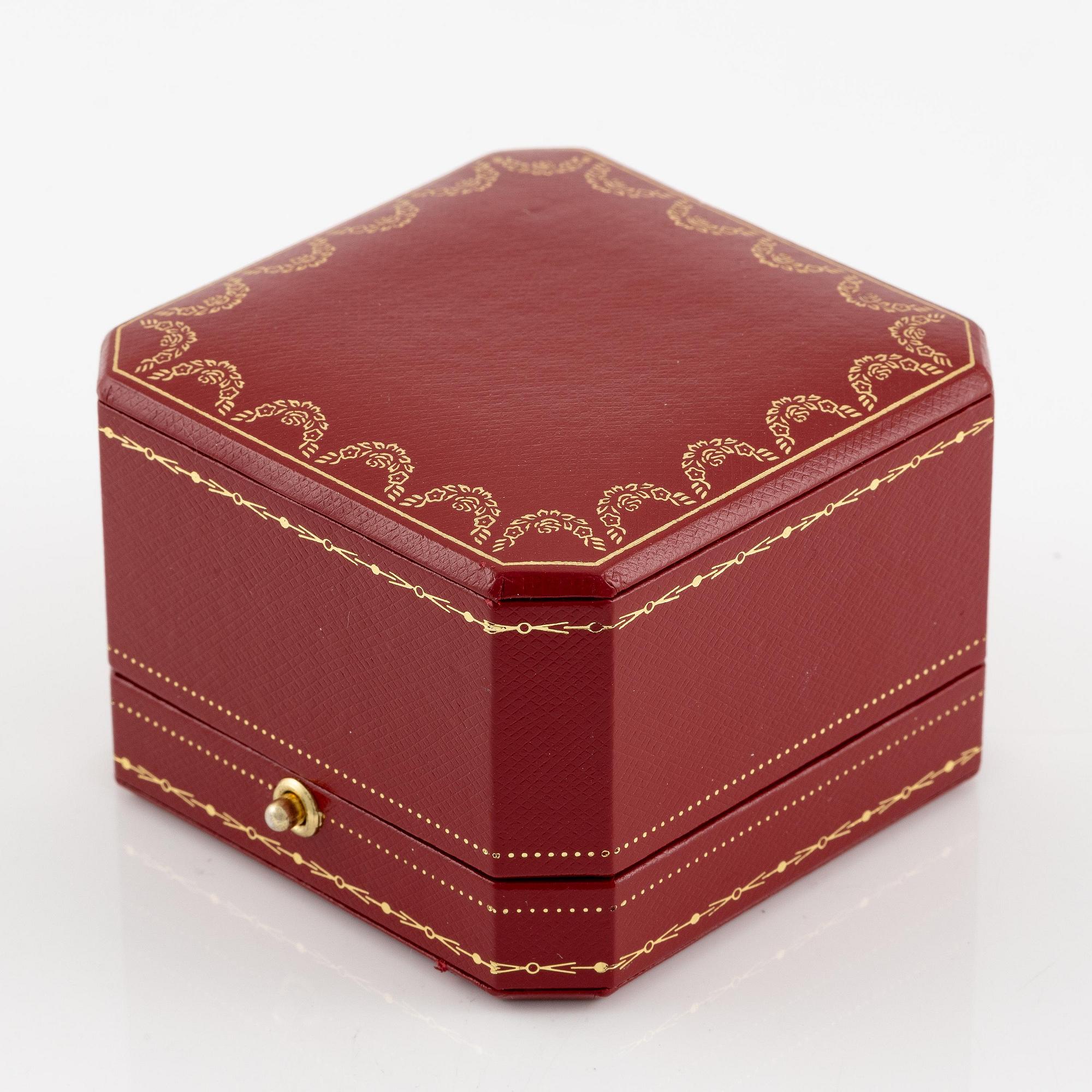 A Cartier ring, "Nouvelle Vague", 18K gold with round brilliant-cut diamonds.