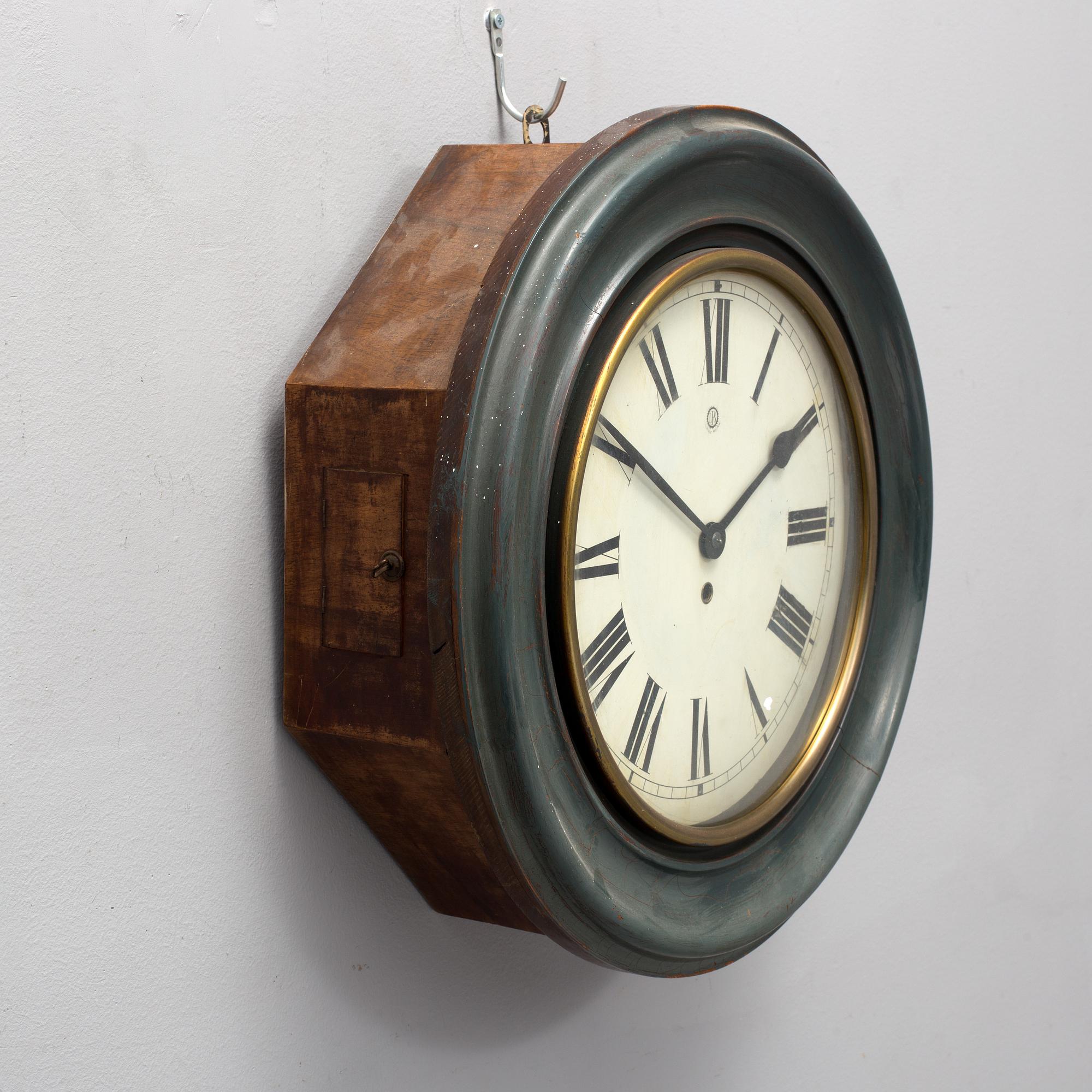 A 19th century wall clock marked LFS Schutz Marke, Germany.