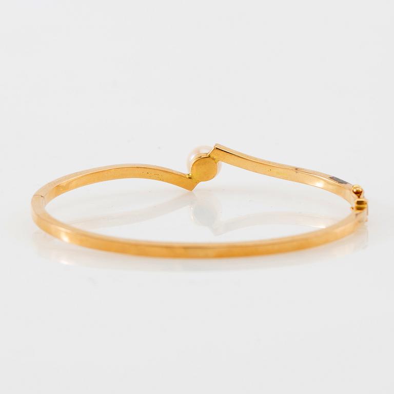 Armring, 18K guld och pärla, Stigbert, Stockholm, 1964.