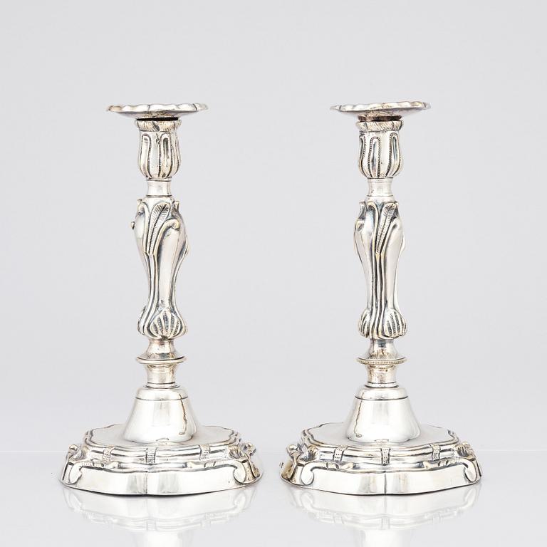 A pair of Rococo candlesticks by Stephen (Friedrich) T. Lemair, (privilge in Stockholm 1762), 1763.