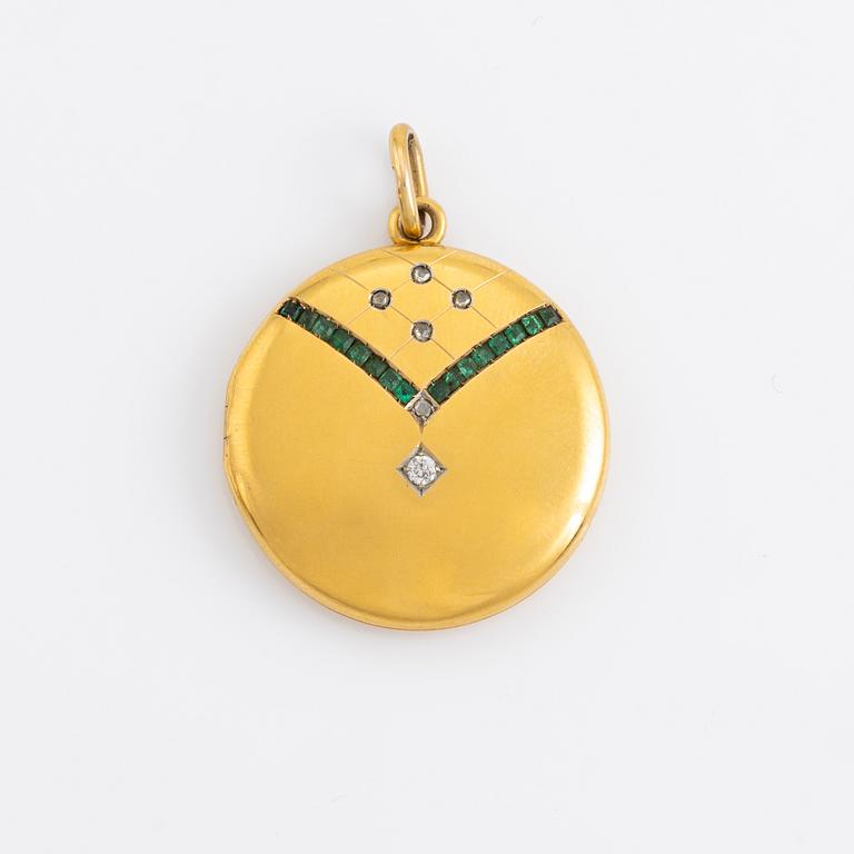 18K gold, emerald and diamond locket pendant.