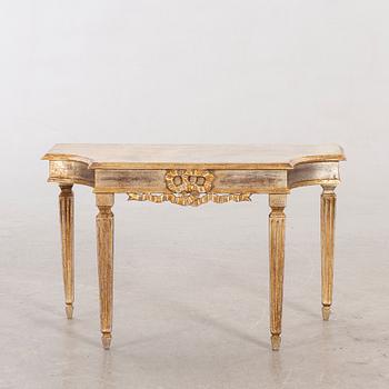 A mid 20th century Louis XVI-style table from Paoletti, Firenze Italy.