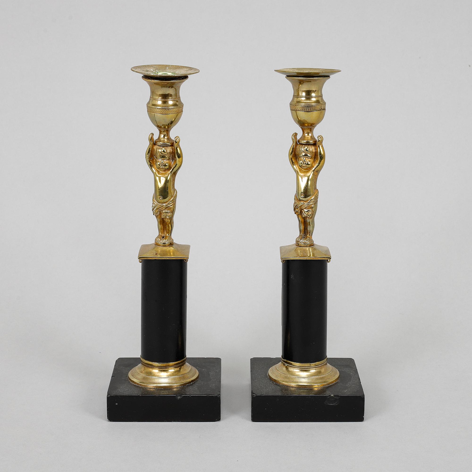 A pair of late gustavian candlesticks, circa 1800.