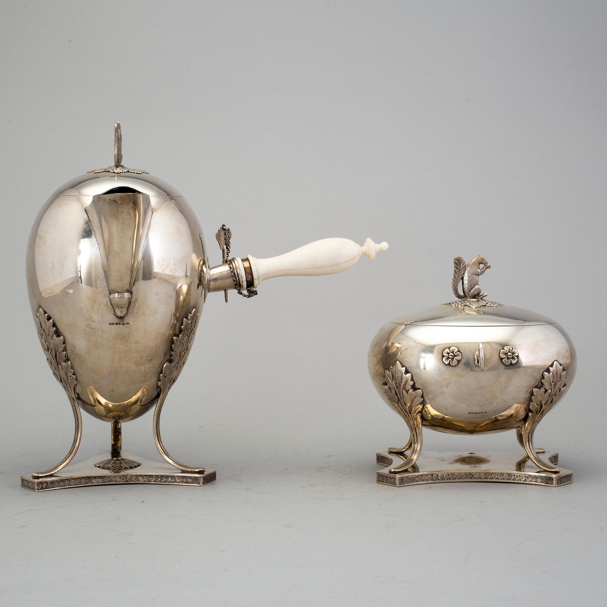 silver coffee pot with ivory handle and sugar bowl by CG Hallberg, Stockholm 1981 and 1920. Weight ca 1681 grams.