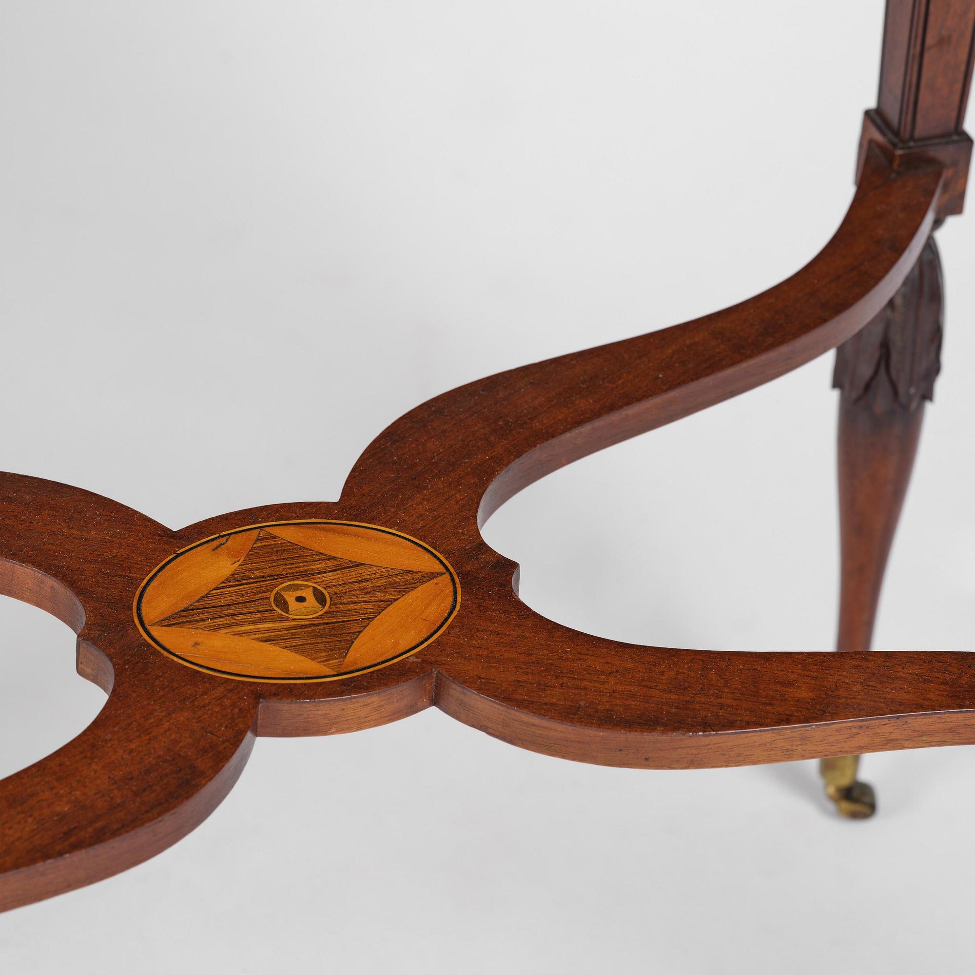 A late Gustavian mahogany parquetry table by L. Qvarnberg '(master in Stockholm 1801-1813).