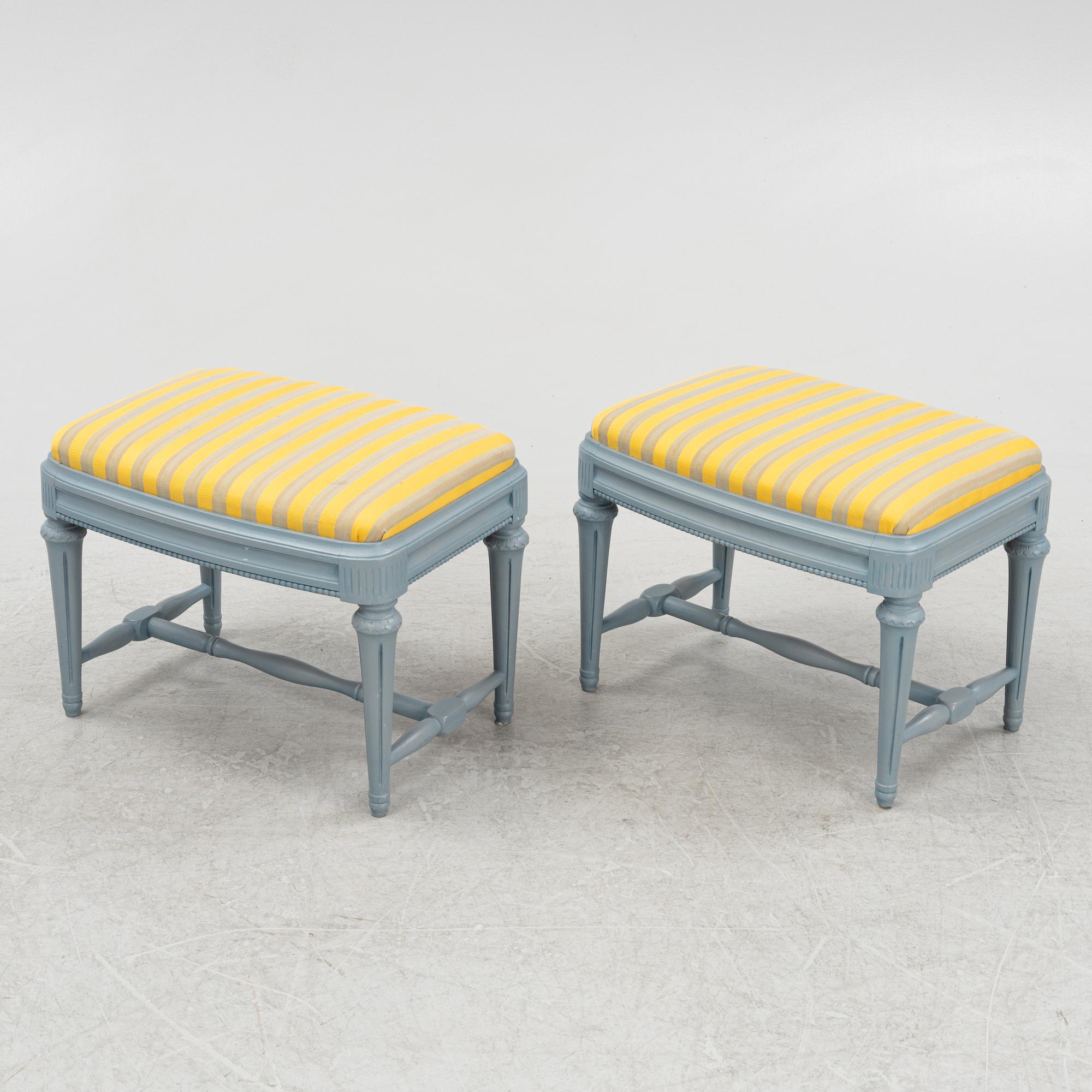 A painted sofa, table, a pair of chairs, a pair of armchairs, a pair of stools, Gustavian style, 20th Century.