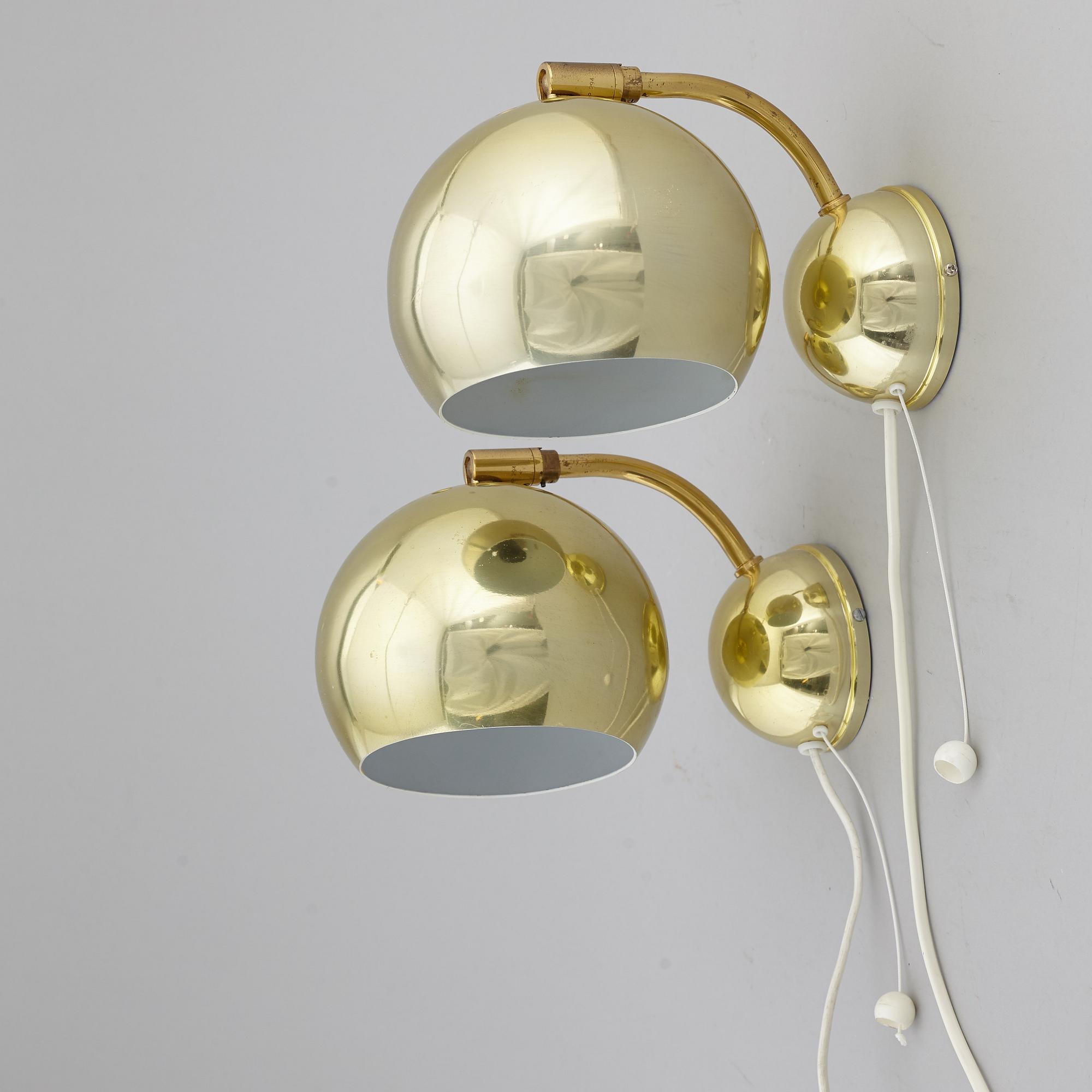 A pair of 1970's wall lamps.