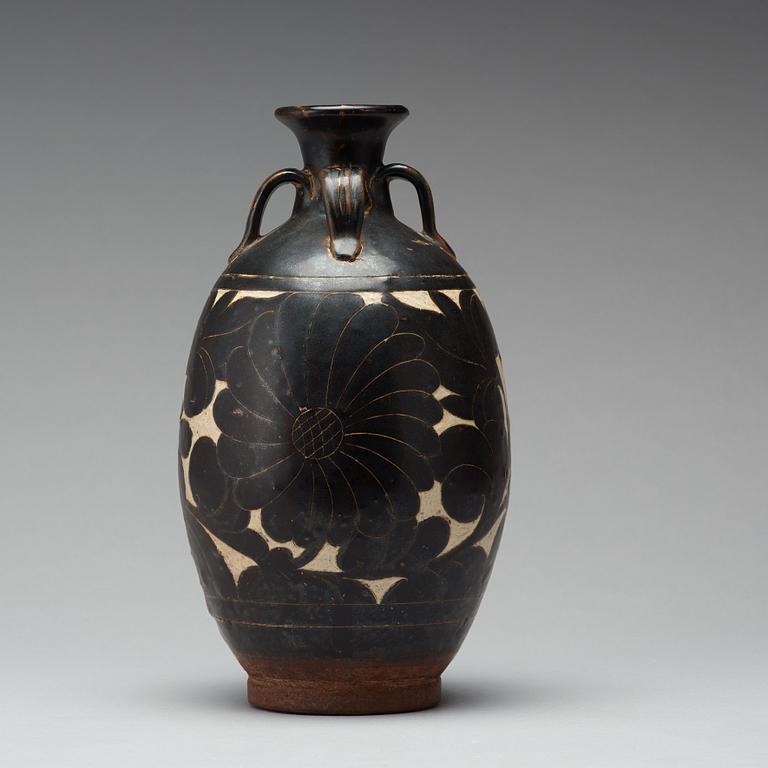 A black-glazed sgraffito vase, presumably Yuan Dynasty.