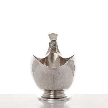 Georg Jensen, a sterling silver sauceboat and ladle, Copenhagen 1925-1945, design nr 98 and 141.