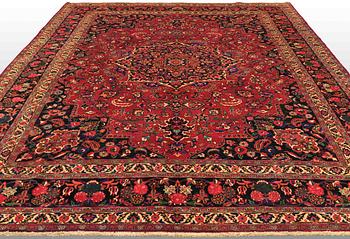 A CARPET, Mashad , signed, around 400 x 310 cm.