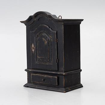 A Baroque wall cabinet, 18th Century.