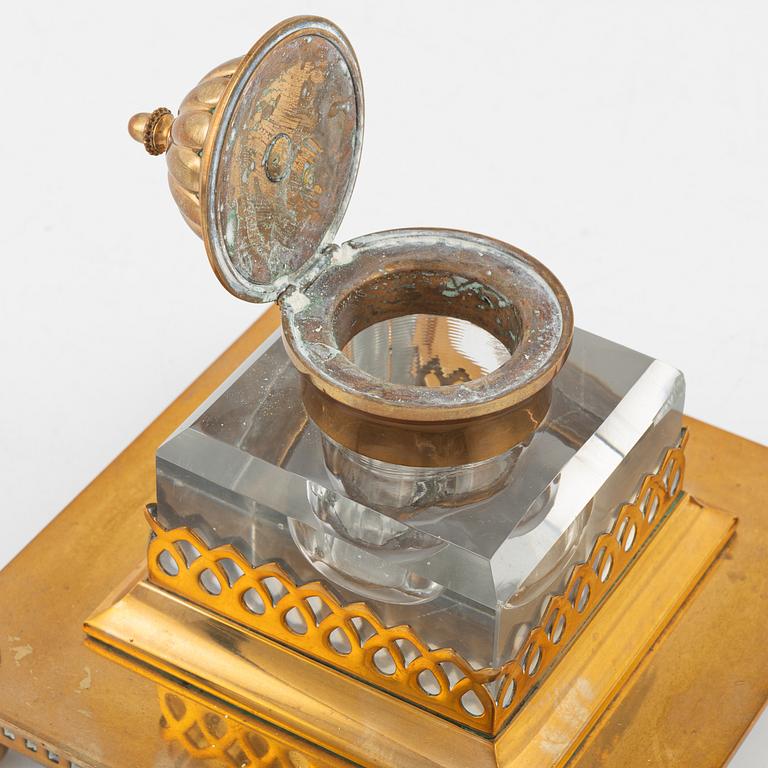 A four-piece brass writing set, Gusum, 20th century.
