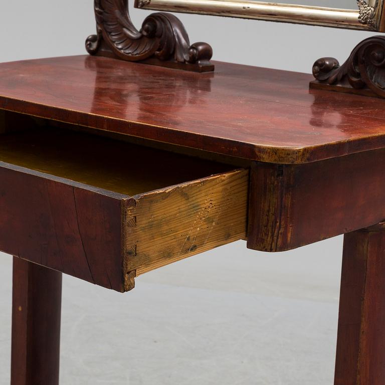 A mid 19th century late empire dressing table.