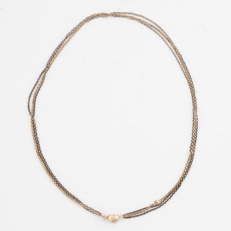 Ole Lynggaard, collier, 14K guld, hjärtformat lås med briljantslipade diamanter.